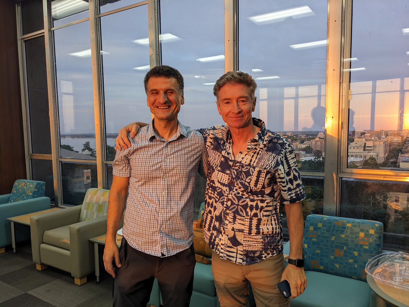 Professors Yavuz and Waleffe smiling at the camera